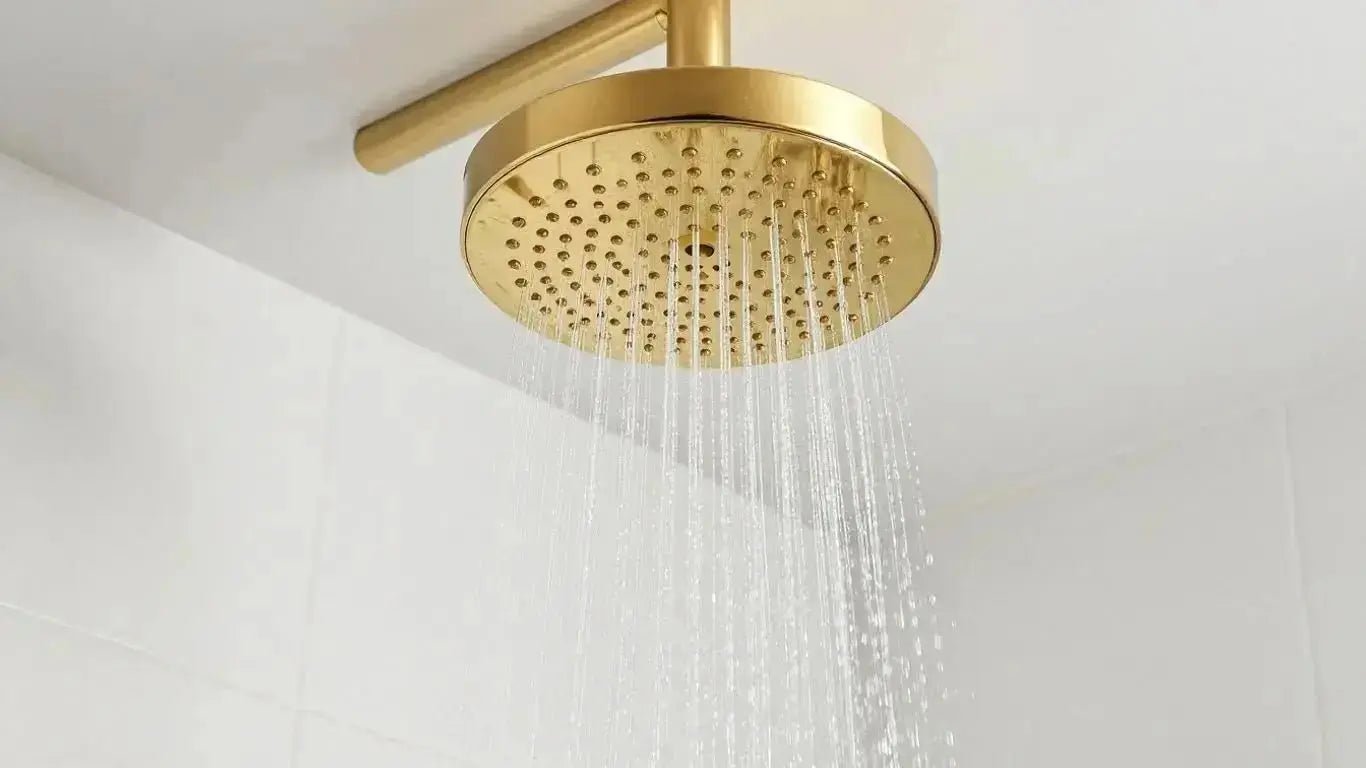 Elevate Your Bathroom with a Stunning Gold Rainfall Shower Head - BathroomLux