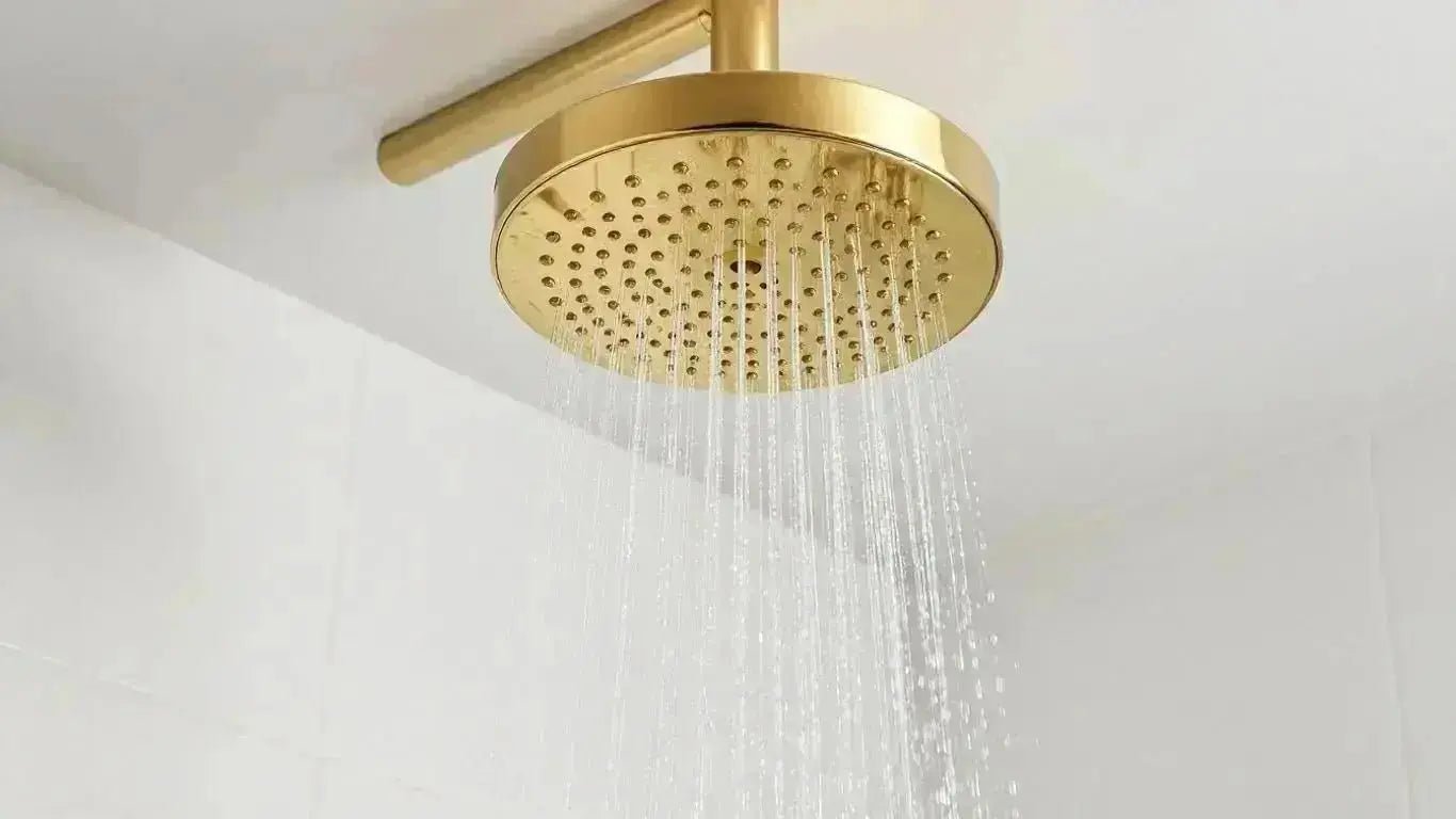 Elevate Your Bathroom with a Stunning Gold Rainfall Shower Head - BathroomLux